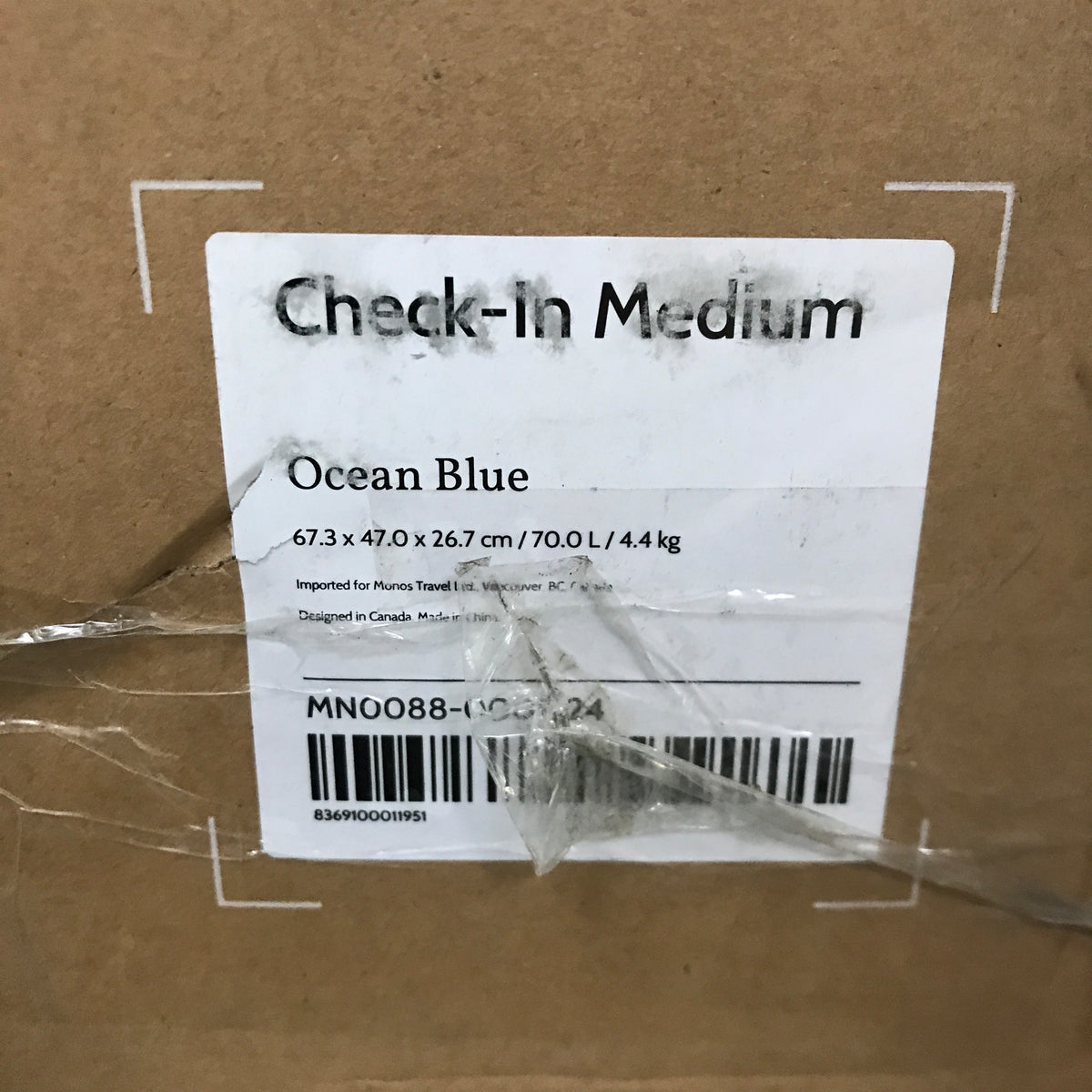 Monos Check-In Medium in Ocean Blue