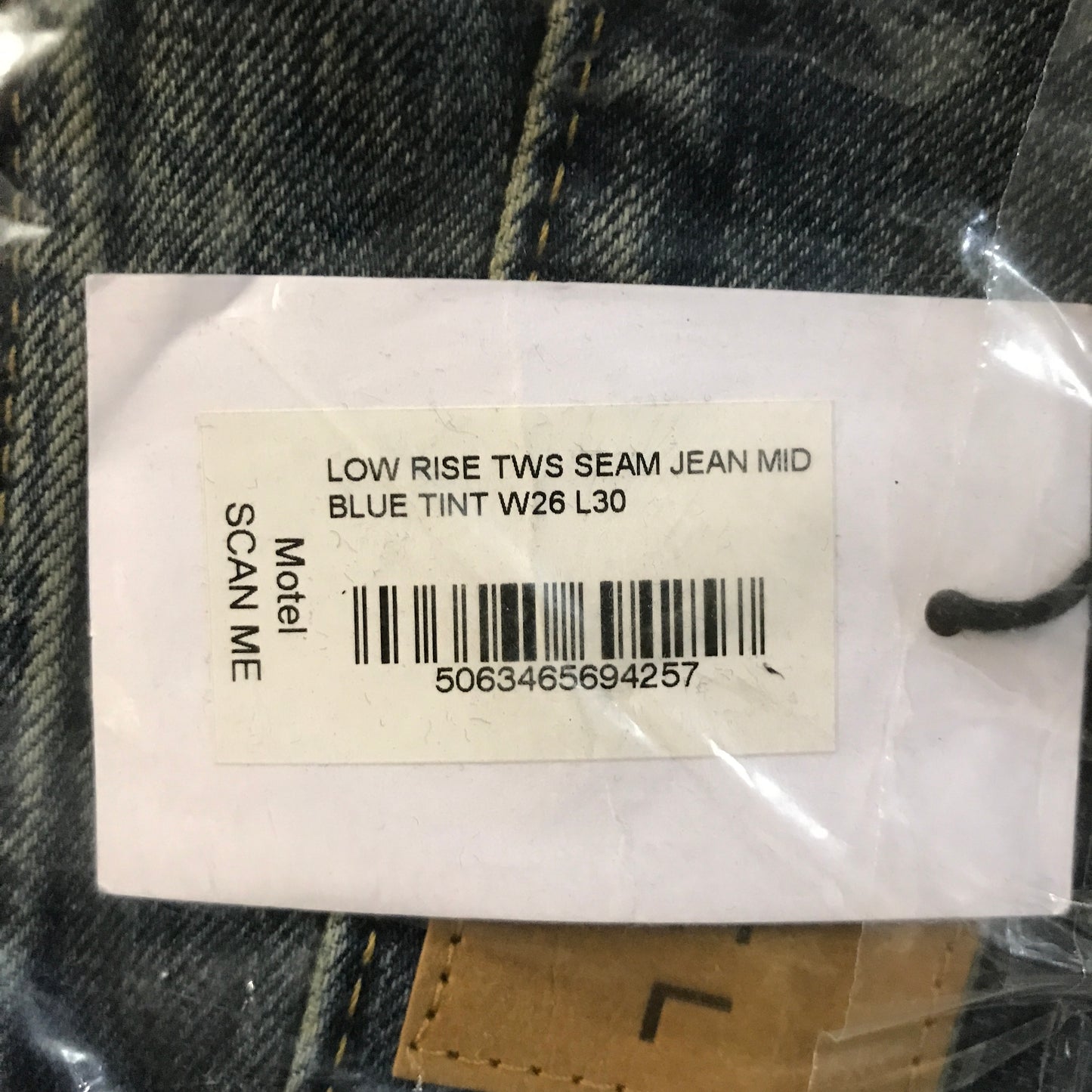 Motel Rocks Low Rise Twisted Seam Jeans In Mid Blue Tint