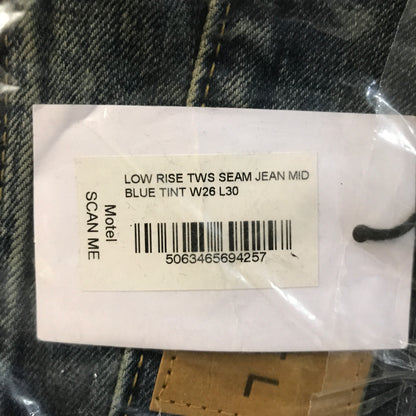 Motel Rocks Low Rise Twisted Seam Jeans In Mid Blue Tint