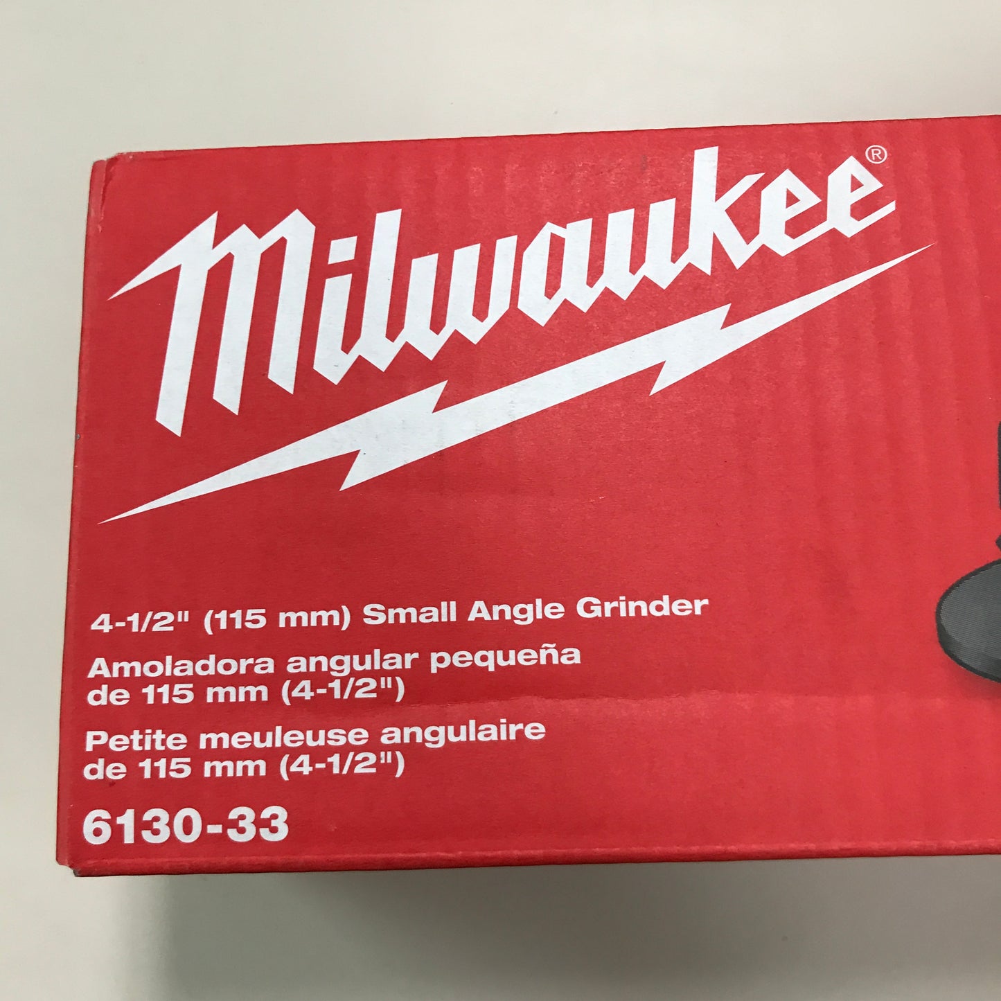 Milwaukee Tool 7 Amp Corded 4-1/2-Inch Small Angle Grinder with Sliding Lock-On Switch