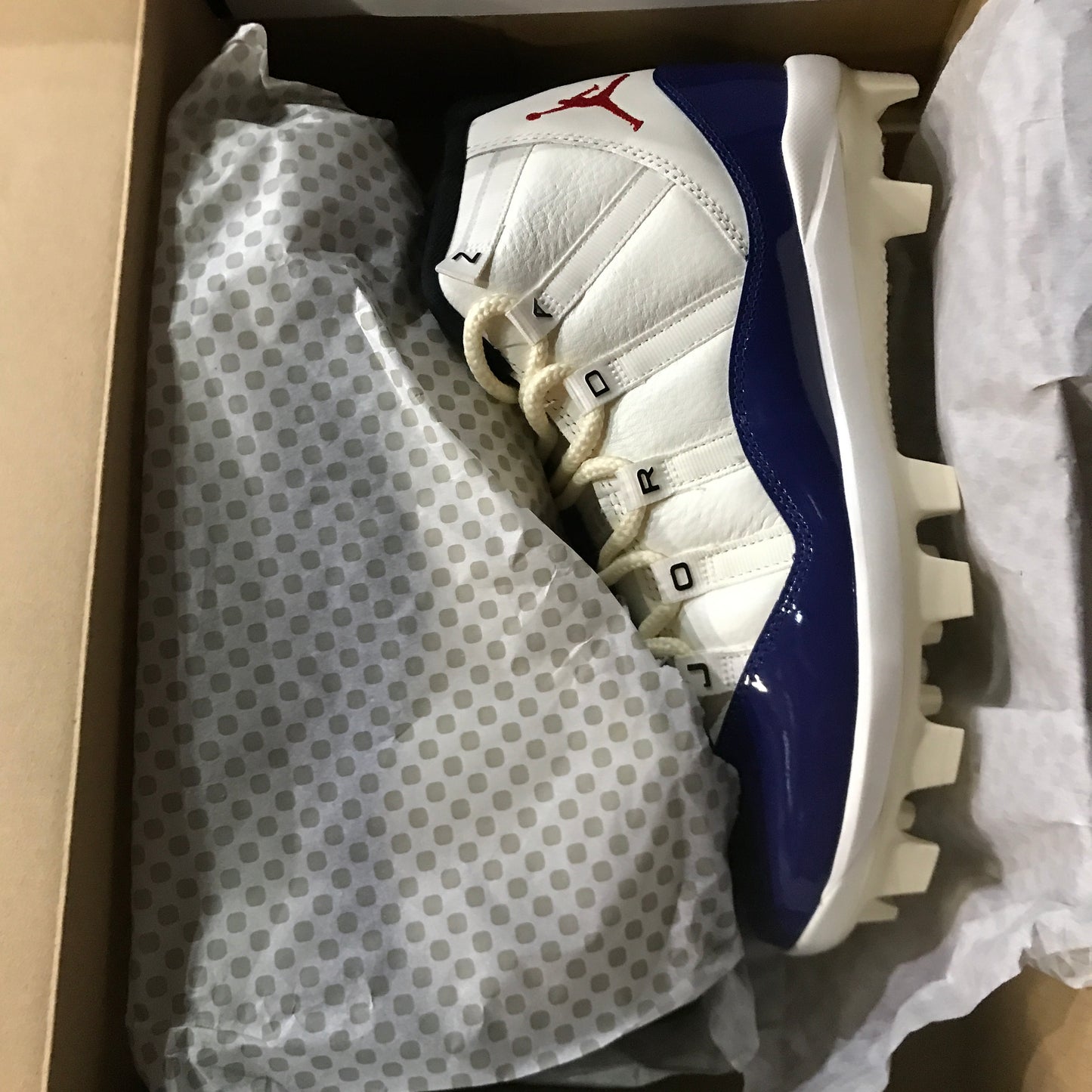 Jordan 11 Retro MCS Men's Baseball Cleats - White/Blue/Red