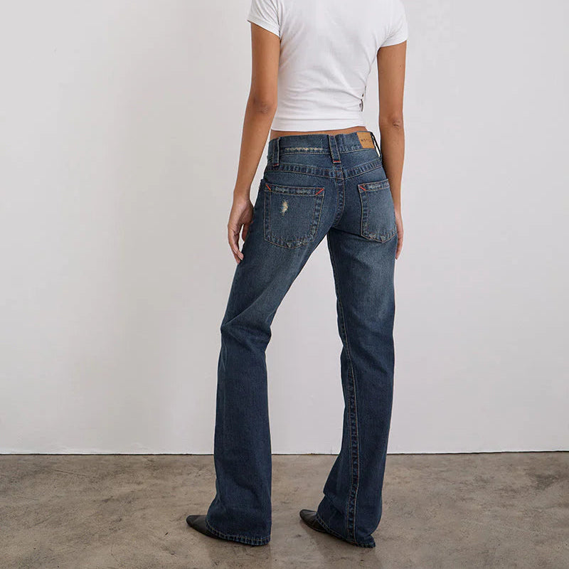 Motel Rocks Low Rise Twisted Seam Jeans In Mid Blue Tint