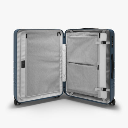 Monos Check-In Medium Suitcase in Ocean Blue